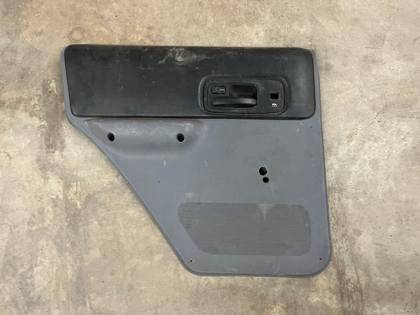 Cherokee XJ (97-01) Driver Rear Door Panel - Black and Grey