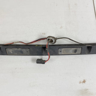 5012553AB Grand Cherokee WJ (99-04) Black Hatch Trim / License Plate Lamp Housing