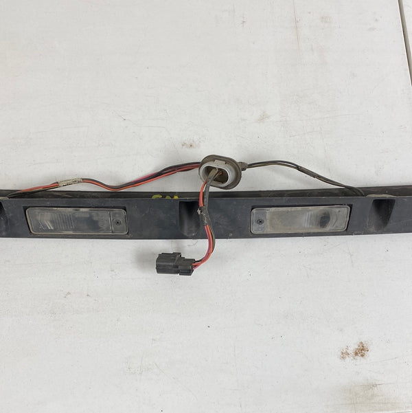 5012553AB Grand Cherokee WJ (99-04) Black Hatch Trim / License Plate Lamp Housing