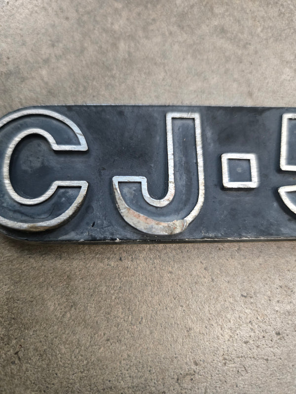 CJ-5 (76-83) Nameplate Emblem (damaged)